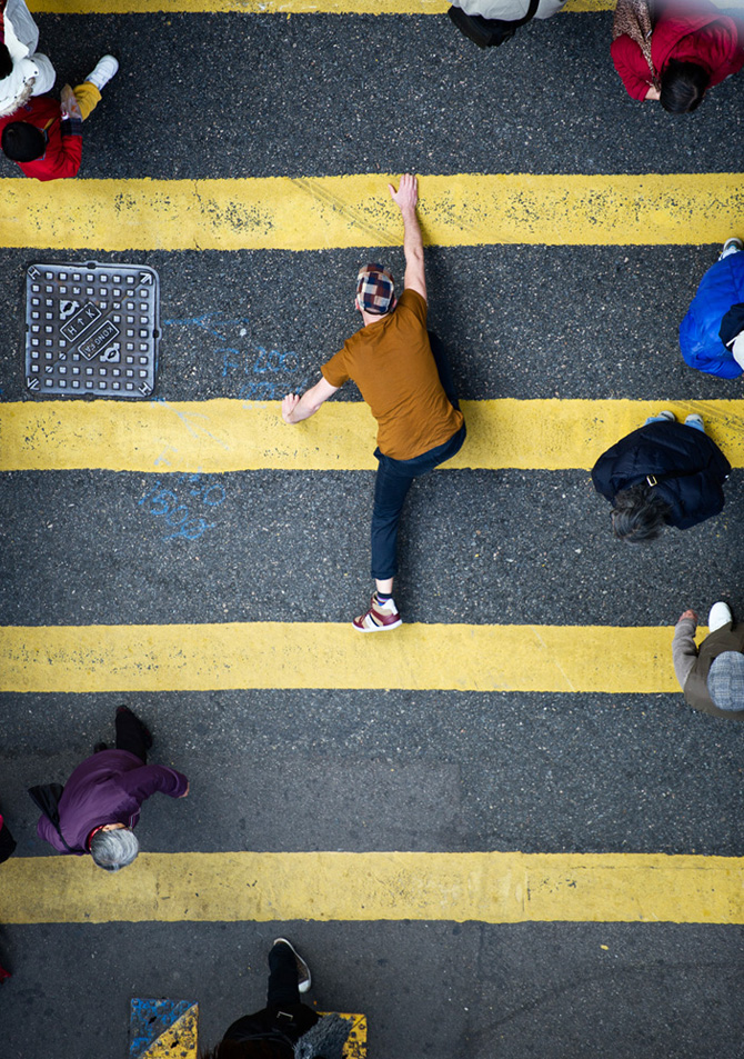Conceptual Photography by Christian Åslund for Jim Rickey, via Yellowtrace. man climbing lines of pedestrian crossing