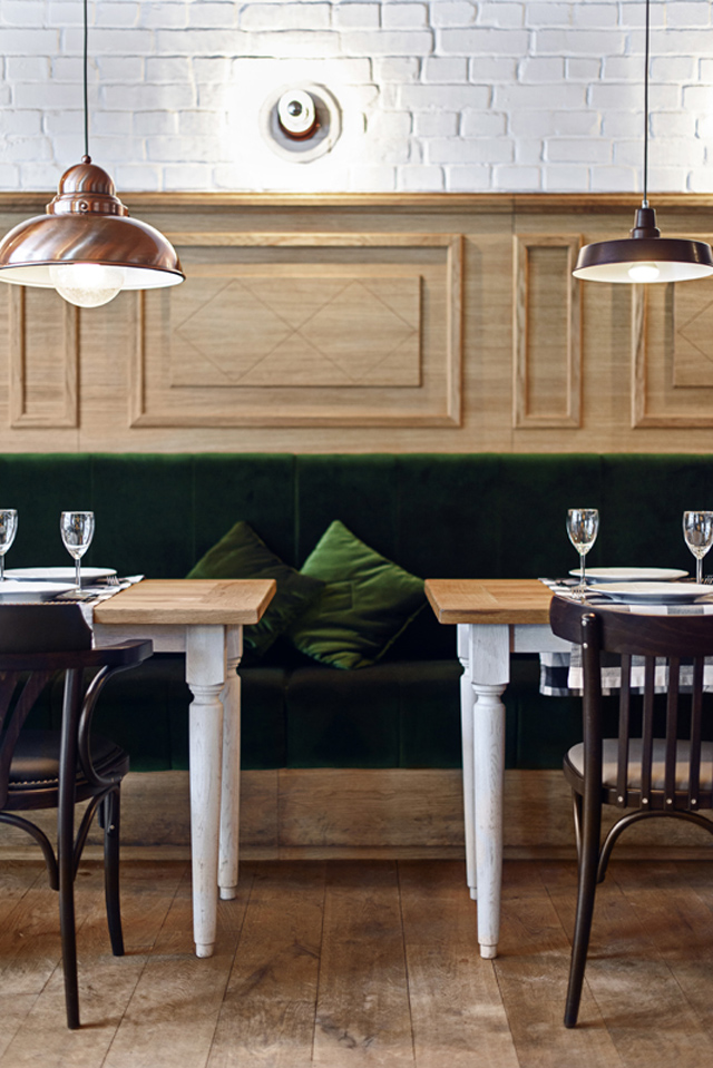Althaus Restaurant by PB Studio and Filip Kozarski in Gdynia, Poland, via Yellowtrace. Althaus Restaurant, dining room, timber wall panelling, white painted brick walls, timber floor, green velvet upholstery