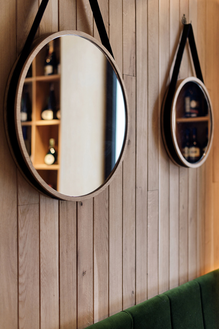 Althaus Restaurant by PB Studio and Filip Kozarski in Gdynia, Poland, via Yellowtrace. timber wall panelling, round mirror, details