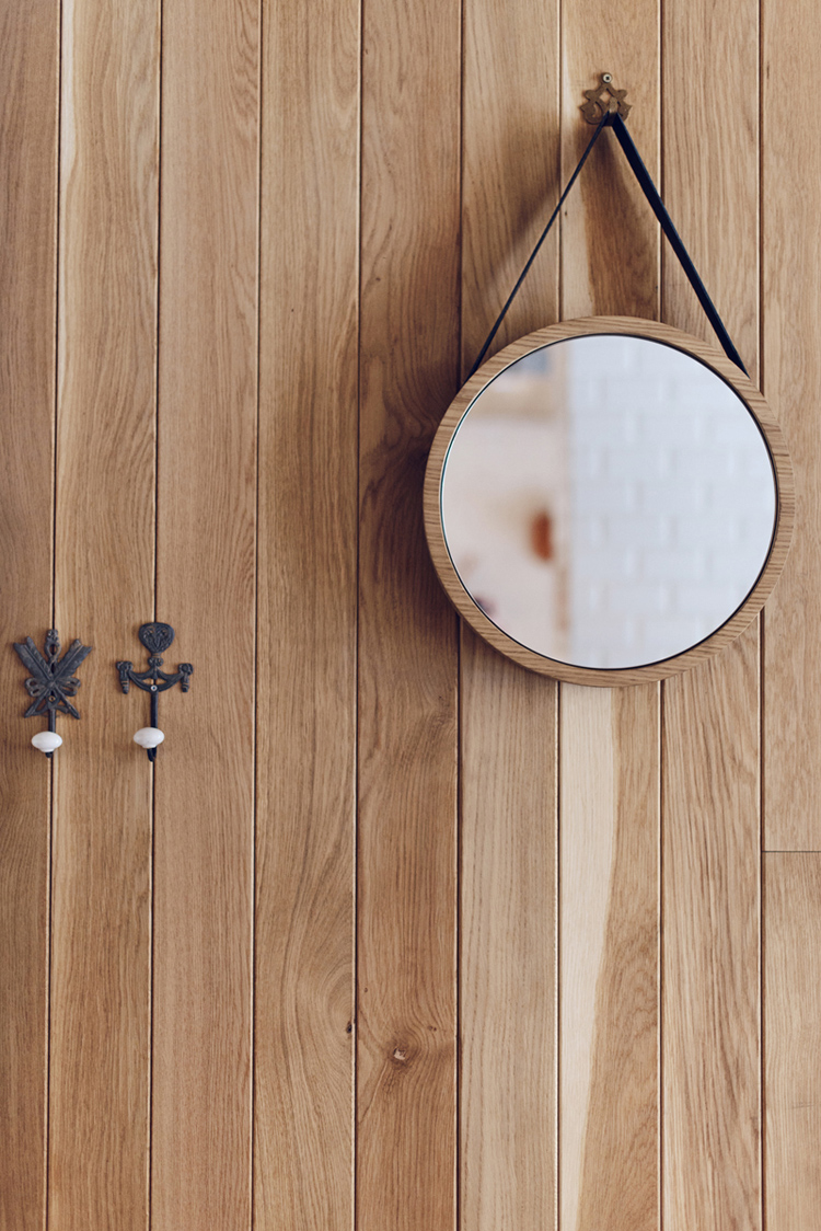 Althaus Restaurant by PB Studio and Filip Kozarski in Gdynia, Poland, via Yellowtrace. timber wall panelling, details, round mirror, wall hooks