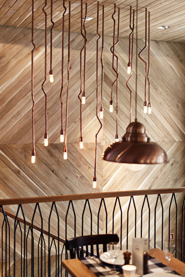 Althaus Restaurant by PB Studio and Filip Kozarski in Gdynia, Poland, via Yellowtrace. Althaus Restaurant, timber wall panelling, copper chandelier