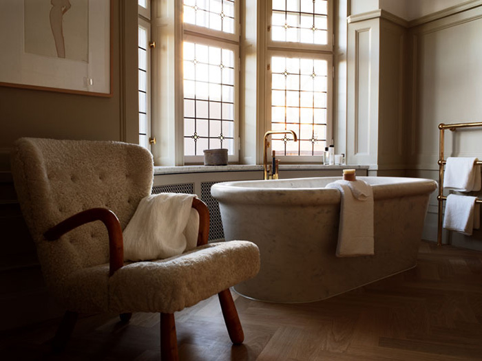 Ett Hem Hotel by Studio Ilse // Stockholm, Sweden, via Yellowtrace. ett hem hotel bathroom with bath carved from single slab of marble