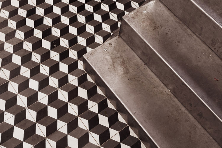 Paris New York Burger Restaurant by CUT architectures in Paris, via Yellowtrace. PNY black and white cement floor tiles and steel stair detail