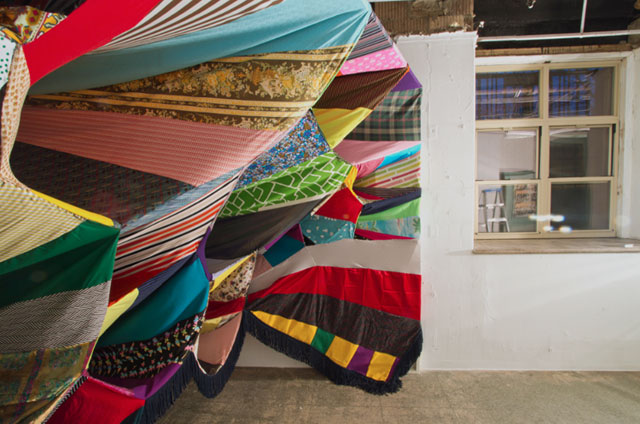 Textile Installation Art by American artist Amanda Browder, via Yellowtrace. Prismatic Vortex by Amanda Browder, recycled textile installation, patchwork pattern and colour