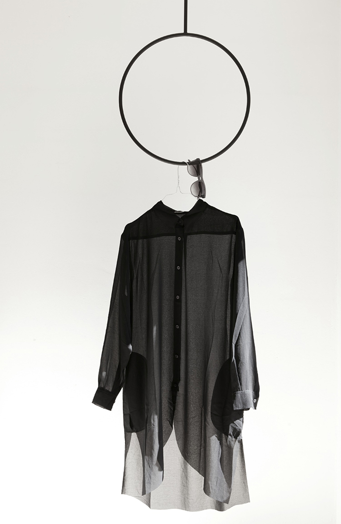 Suspended clothing rails by Annaleena Leino | Yellowtrace.